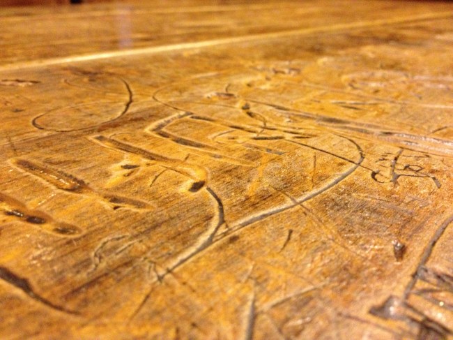 carved table student pub